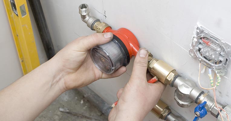 Installation of water meter in the kitchen. metal-plastic PVC pipe